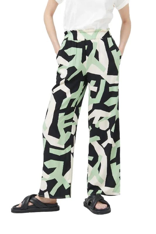 Geo Print Trousers In Green